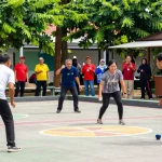 Players enjoying a competitive petanque match at fopikotatarakan.org, showcasing community sports spirit.